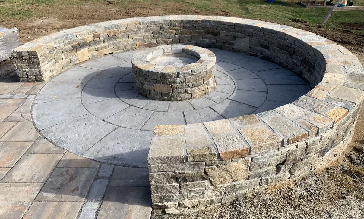 flagstone fire pit with sitting area